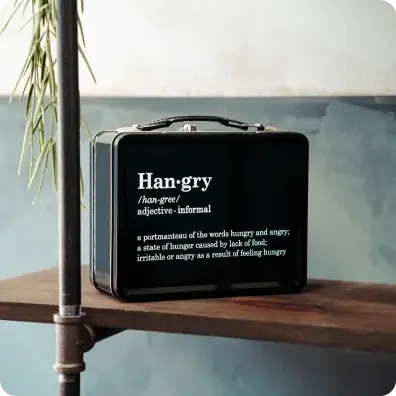 Custom Lunchbox Custom black lunchbox on a wooden shelf.