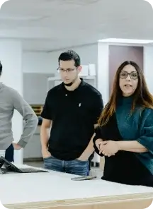 Team members discussing brand strategy.